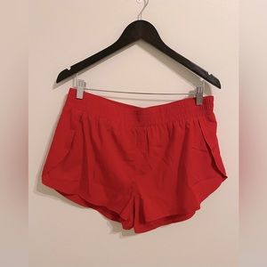 Brand new. AS revival. Red shorts. Size L